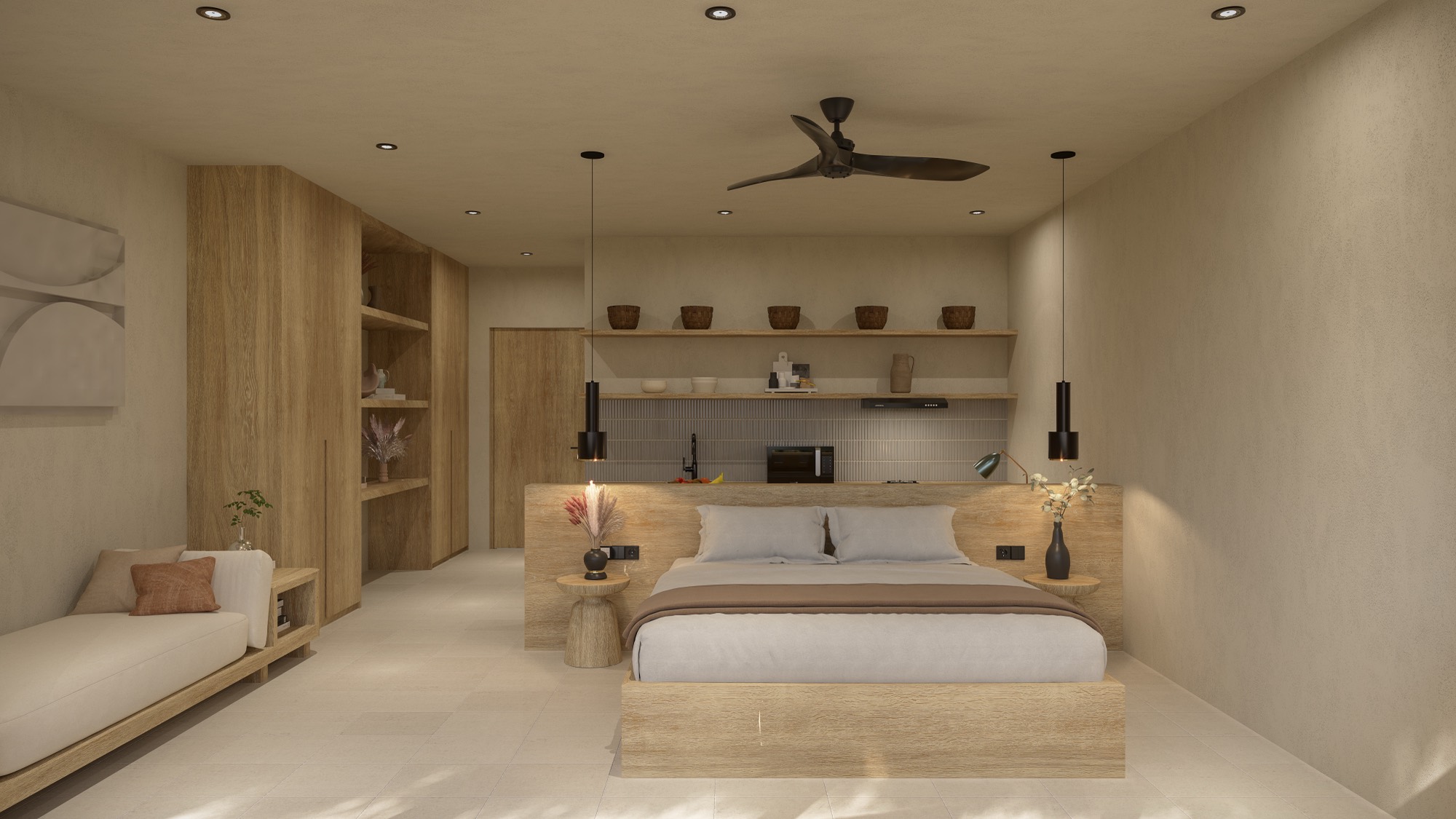Studio interior with king bed, oak joinery and kitchenette