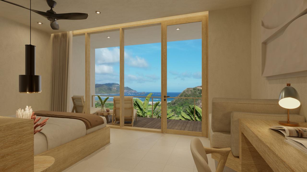 Studio bedroom opening onto the ocean-facing terrace